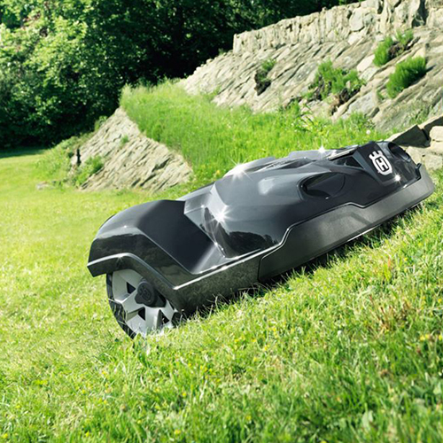 An auto-mower mowing the grass