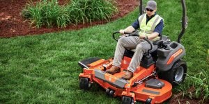 man riding a lawn mower